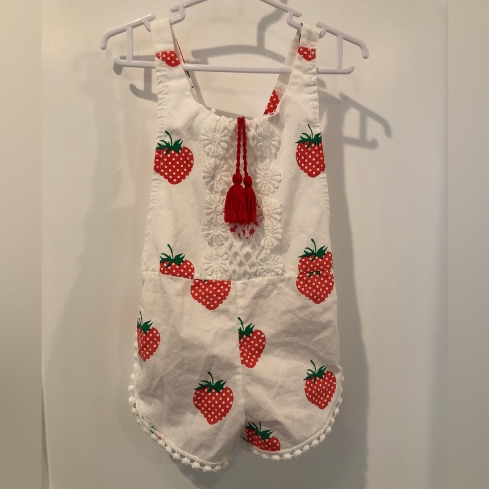 12-18 months adjustable strawberry romper 100% cotton.